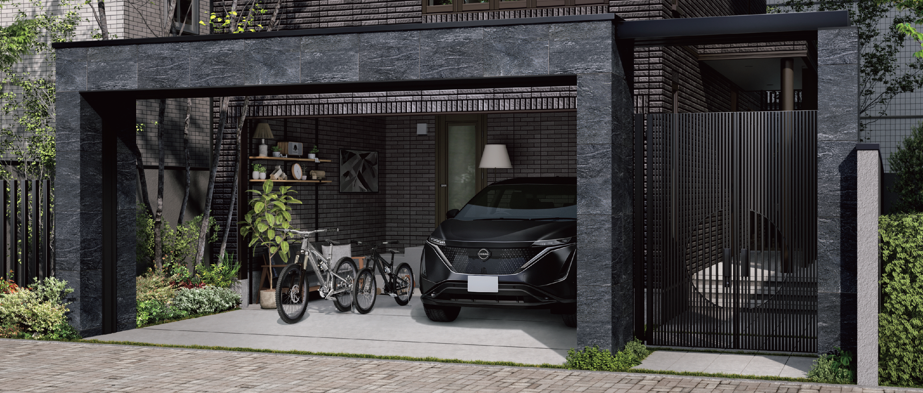 車と自転車が並ぶ黒いフレームのモダンなビルトインガレージ