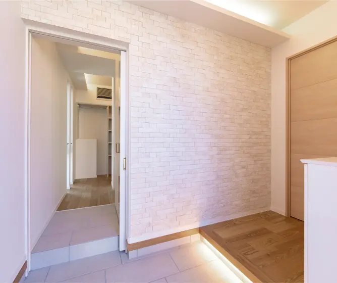 納戸につながる動線のある玄関